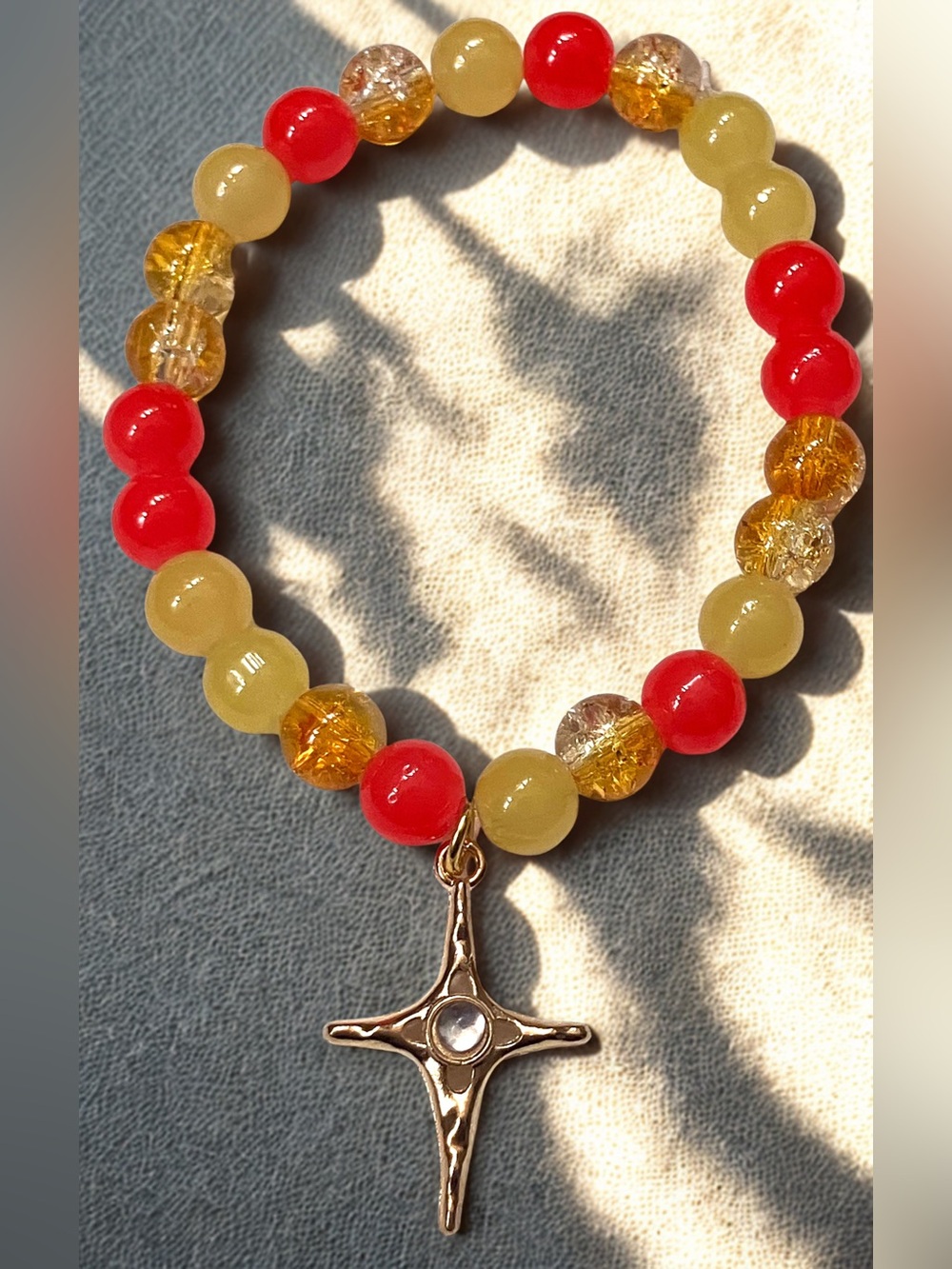 Gold Star charm/ orange and yellow glass beaded bracelet hand crafted
